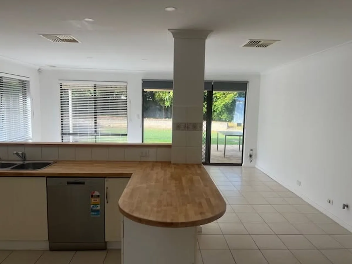 Open plan kitchen and living area cleaned and cleared ready for a rental inspection